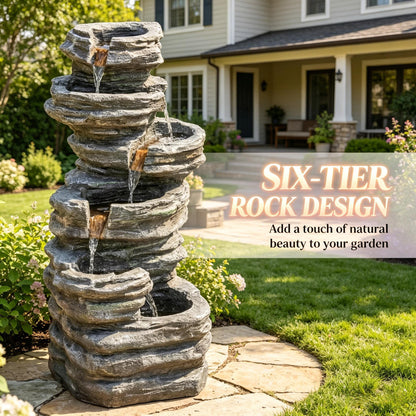 Resin 6 Tier Rock Cascade Outdoor Fountain 40 Inch LED shown close up on a garden path with water flowing between tiers.