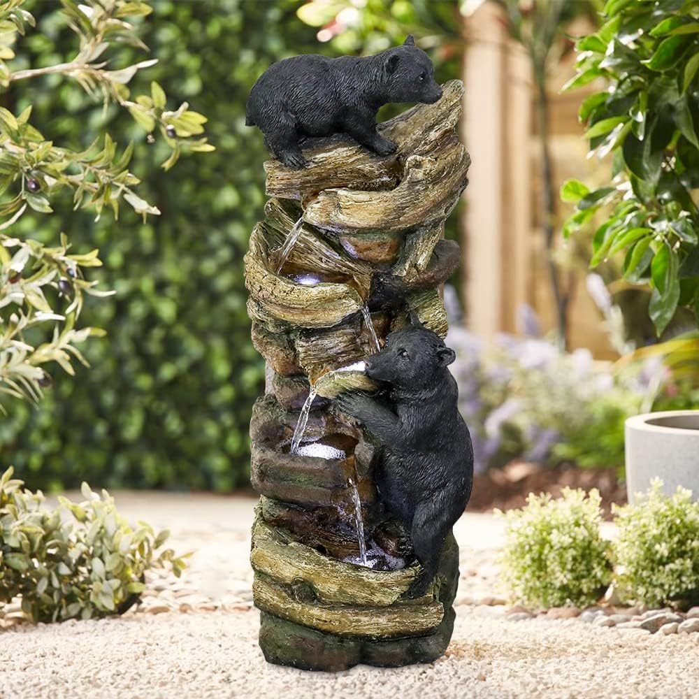 Resin Two Bear Cub Animal Outdoor Water Fountain 39 in stands among garden plants as water trickles over its rock-like tiers.