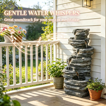 Resin 6 Tier Rock Cascade Outdoor Fountain 40 Inch LED stands on a sunny porch beside potted plants and white railings.
