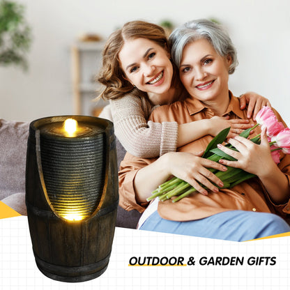 Resin Rustic Barrel Outdoor Water Fountain 24 Inch LED beside two women holding pink tulips.