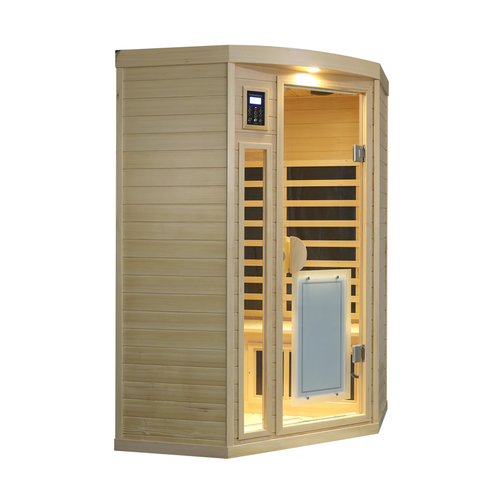 Hemlock Pentagonal Indoor Far Infrared Sauna Room viewed from the left, showing the front glass door and side wall.