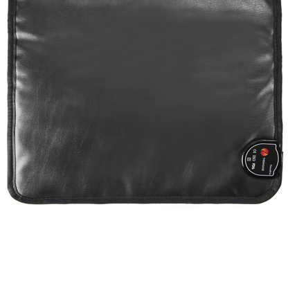 TheraPro™ PEMF pad shown from the smooth black back, with a small label near one corner on a white background.