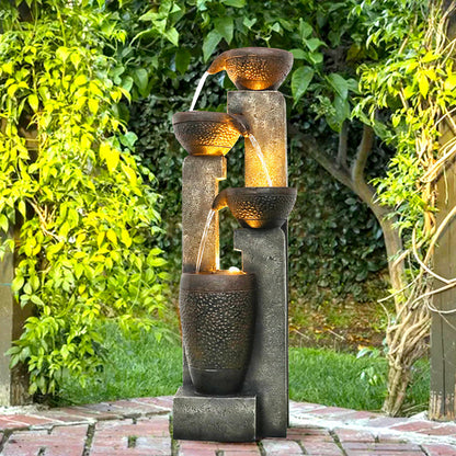 Resin Stacked Clay Pot Outdoor Water Fountain 40 Inch on a brick path beneath leafy trees.