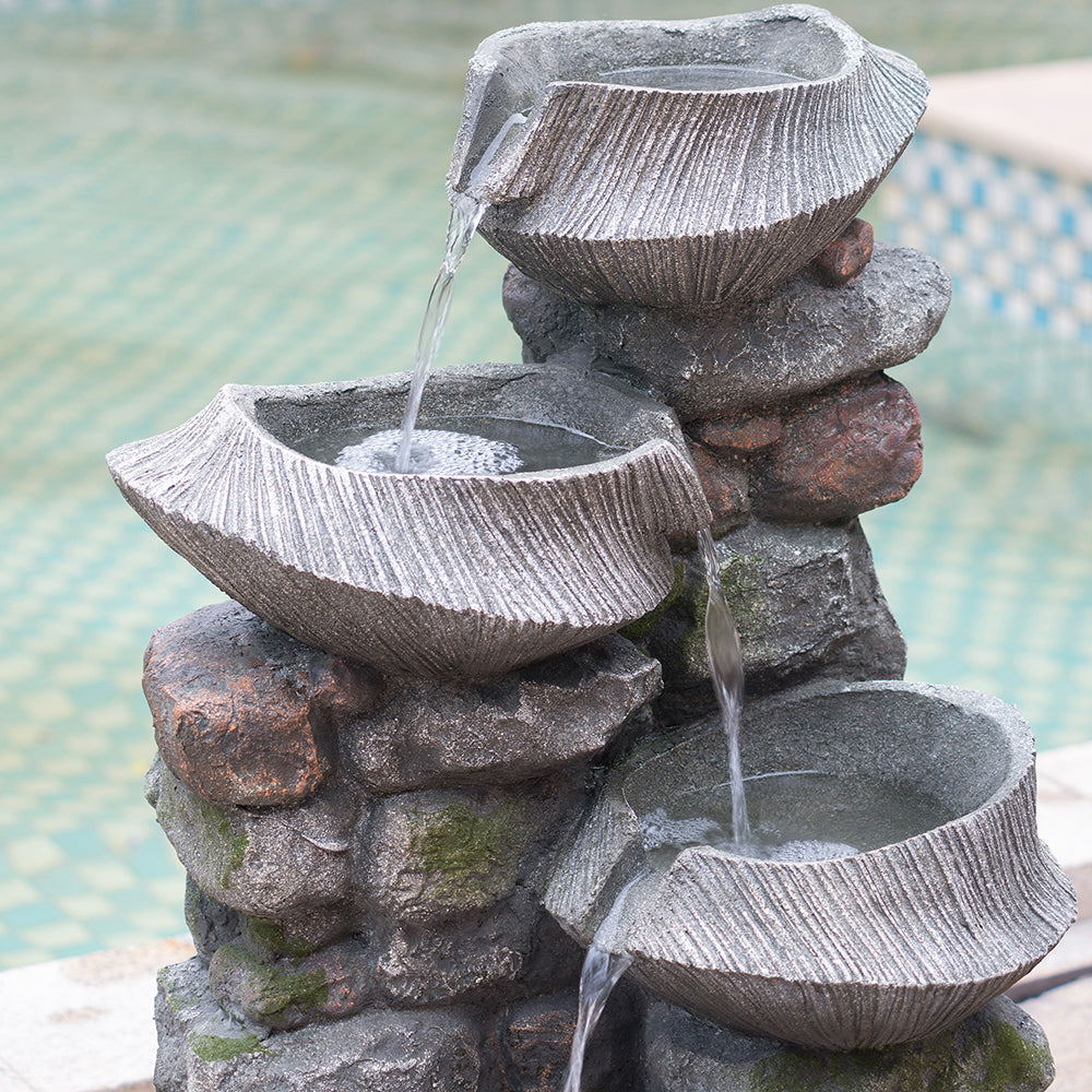 Close-up of Resin Fluted Basin Tiered Outdoor Water Fountain 650 GPH showing water flowing.