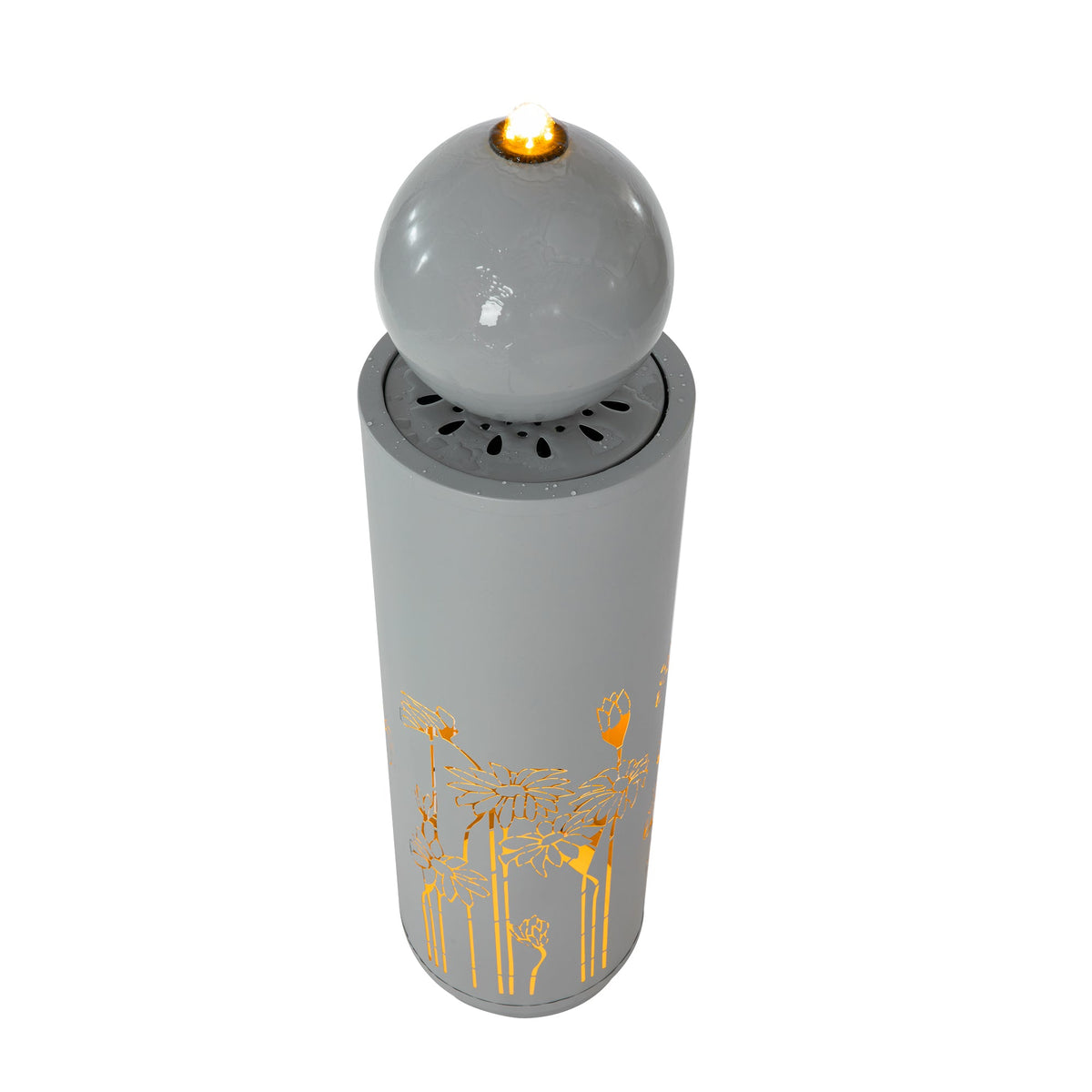 Metal Sphere Water Fountain Outdoor shown from above, with a glowing sphere and floral cutouts on its gray column.