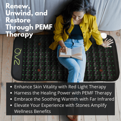 A woman sits reading on the Infrared PEMF Travel Mat on a wood floor, with text overlays.