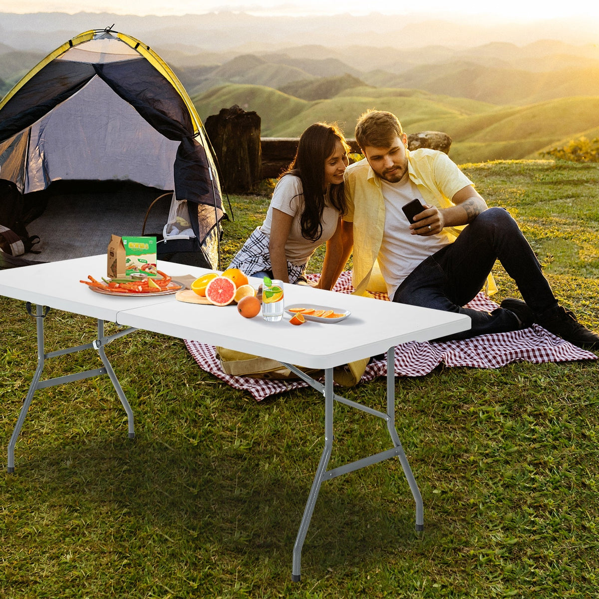 X-Pro 35000 BTU 4 Zone 22.5 SEER2 Concealed Ducted Mini named beside a campsite scene with a couple at a table.