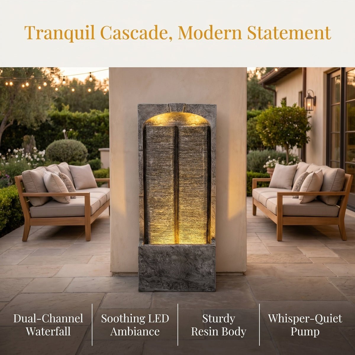 Resin Slate Outdoor Water Wall Fountain is centered between outdoor sofas on a paved garden patio.